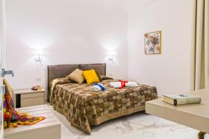 Voodi või voodid majutusasutuse Corinzia Casa Vacanze toas
