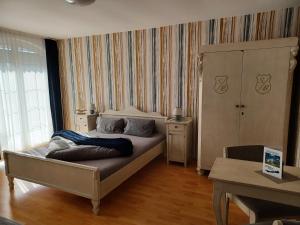 Postel nebo postele na pokoji v ubytování Margret Haus