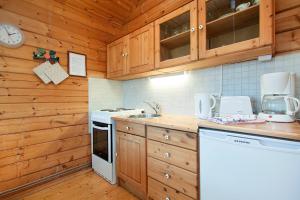 Kuchyň nebo kuchyňský kout v ubytování Nupar Cottages