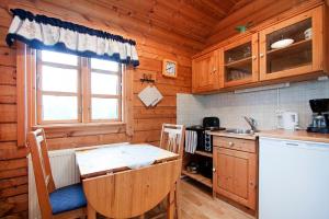 Kuchyň nebo kuchyňský kout v ubytování Nupar Cottages