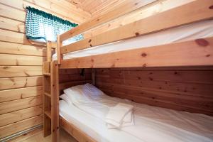 Postel nebo postele na pokoji v ubytování Nupar Cottages