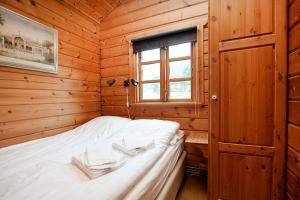 Postel nebo postele na pokoji v ubytování Nupar Cottages