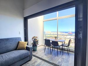 Posezení v ubytování Très Beau Duplex vue panoramique Mer, Proche Plage