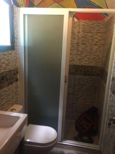 Ein Badezimmer in der Unterkunft Roça Saudade Guest House