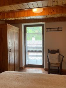 A bed or beds in a room at Casa Curti