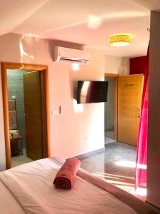 Postel nebo postele na pokoji v ubytování Residence Antiqua Rooms