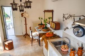 Kuchyň nebo kuchyňský kout v ubytování Cortebbianca