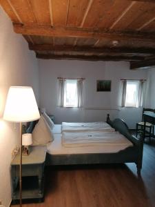 Llit o llits en una habitació de Olbersdorfer Hof