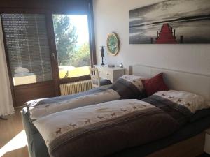 Postel nebo postele na pokoji v ubytování Exklusives Apartment in Bad Säckingen für 2 Person