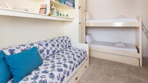 Postel nebo postele na pokoji v ubytování Coral Coast Alghero + 8 fotografií