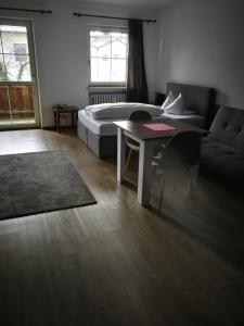 Postel nebo postele na pokoji v ubytování Hotel Luitpold