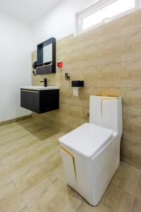 Una televisión o centro de entretenimiento en C-view Apartments