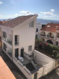 an aerial view of a building with a balcony at Farau B&B in Messina