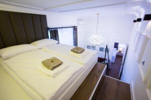 Letto o letti in una camera di Apartments Zagreb1875