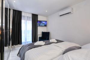 Posteľ alebo postele v izbe v ubytovaní Luxury Holiday House Zadar