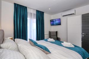 Posteľ alebo postele v izbe v ubytovaní Luxury Holiday House Zadar