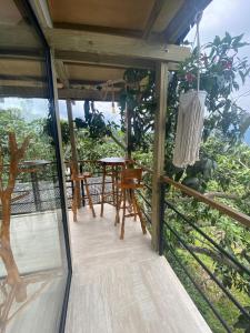 Ein Balkon oder eine Terrasse in der Unterkunft Glamping Entrearboles - Bellavista