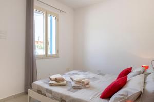 Postel nebo postele na pokoji v ubytování casa perla marina