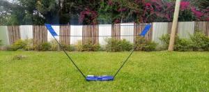 a swing in the grass in a yard at Kwetu Home - Sagana PAY BEFORE ARRIVAL in Sagana