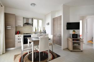 Kuchyň nebo kuchyňský kout v ubytování casa perla marina + 22 fotografií