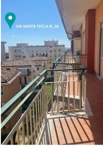 a balcony with a view of a city at Angelina Apartments Amalfi Coast in Maiori