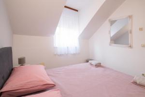 Letto o letti in una camera di Oleander Apartments Split