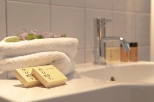 A bathroom at Roommo Viuzzo delle Canne