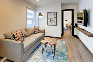 a living room with a couch and a table at Manzanita Holiday 2 in South Lake Tahoe