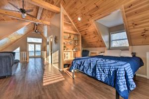 a bedroom with a bed and a wooden ceiling at Lakefront Lexington Escape: Steps to Beach! in Lexington
