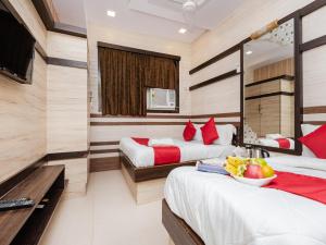 TV a/nebo společenská místnost v ubytování Hotel Al Moazin