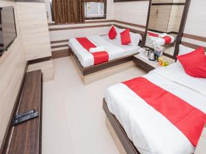 Postel nebo postele na pokoji v ubytování Hotel Al Moazin