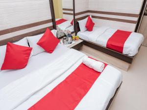 Postel nebo postele na pokoji v ubytování Hotel Al Moazin