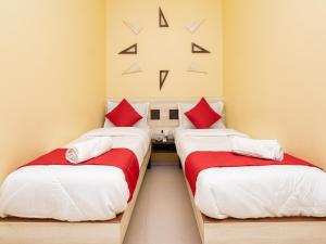 Postel nebo postele na pokoji v ubytování Hotel Al Moazin