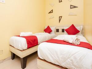 Postel nebo postele na pokoji v ubytování Hotel Al Moazin