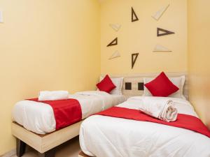 Postel nebo postele na pokoji v ubytování Hotel Al Moazin