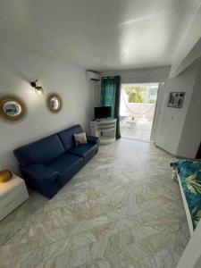 Posezení v ubytování Appart adorable proche de la baie orientale, Idolem résidence unité 2 - 57 Rue du Mont Vernon 1