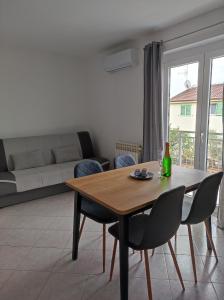 Posezení v ubytování Apartments Erenda