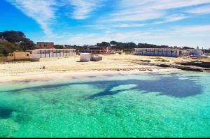 a view of a beach with a body of water at Stabilimento Lido Burrone in Favignana
