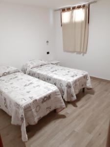 Krevet ili kreveti u jedinici u objektu Appartamento di Andrea