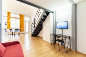 Televízia a/alebo spoločenská miestnosť v ubytovaní GiNa Guest House