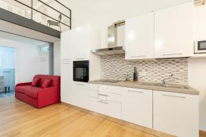 A kitchen or kitchenette at GiNa Guest House