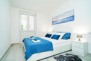 Posteľ alebo postele v izbe v ubytovaní Porto new Dubrovnik