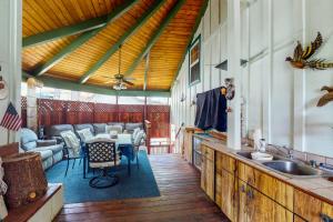 a kitchen and living room with a table and a couch at Knott Lakeview in Bass Lake +27 photos