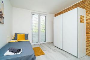 Posteľ alebo postele v izbe v ubytovaní Porto new Dubrovnik