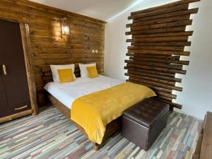 A bed or beds in a room at Belvedere Hills
