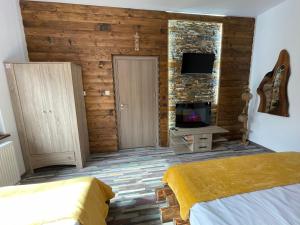 A bed or beds in a room at Belvedere Hills