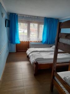 Postel nebo postele na pokoji v ubytování Къща Ради