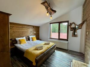 A bed or beds in a room at Belvedere Hills