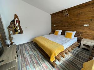 A bed or beds in a room at Belvedere Hills