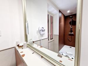 Koupelna v ubytování Hôtel Bella Vista